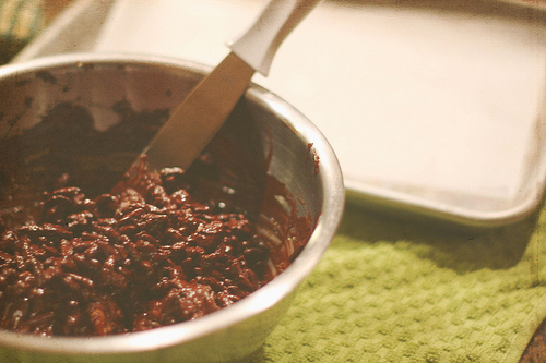An image of a mixing bowl with a mixture of chocolate crunchies. 