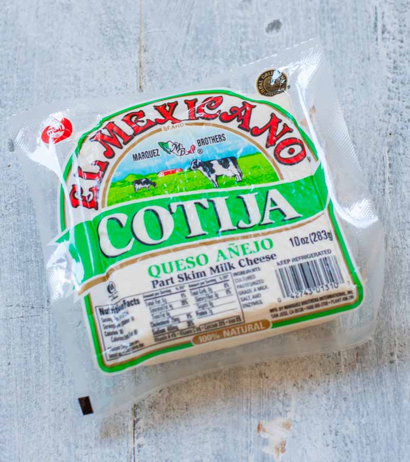 Mexican Cotija cheese in a plastic package.