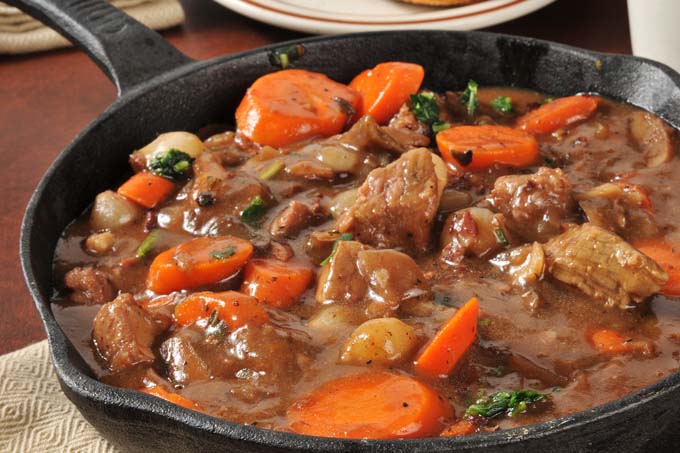 Gourmet Beef Stew Served In A Cast Iron Skillet