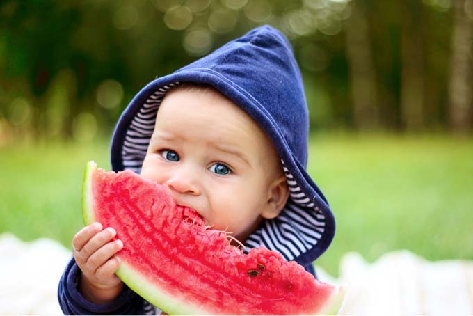 baby eating water melon