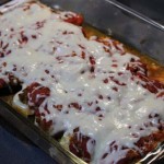 Low Carb Zucchini Boats in roasting pan in overn