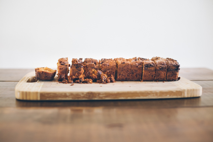 ginger pear coffee cake with streusel topping that has been sliced up | Foodal