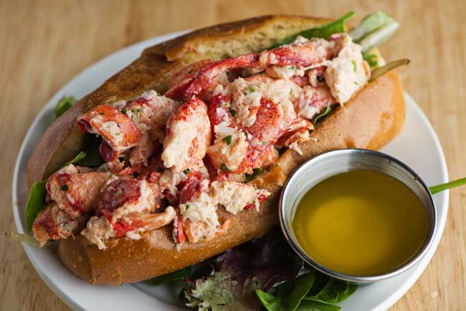 Maine lobster roll with butter poached lobster meat | Foodal.com