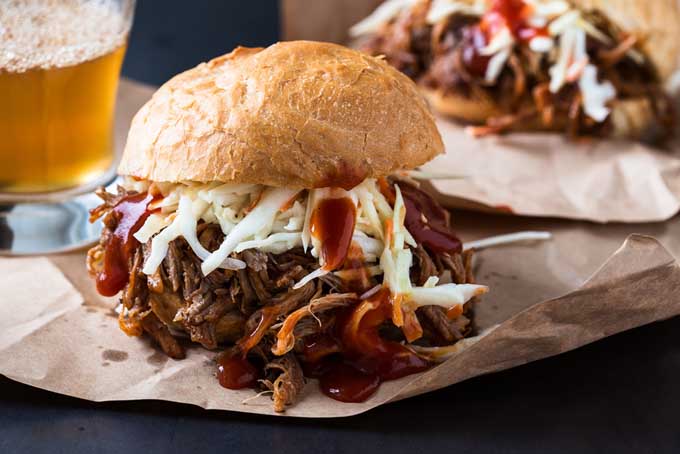 Pulled pork sandwich with coleslaw on top