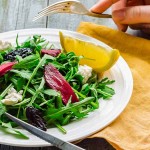 Recipe for Fresh Green Salad with Arugula, Beets, Goat Cheese, and Olive Oil | Foodal.com