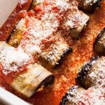 Close up oblique view of a prepared Vegetarian Gluten-free Eggplant, Kale & Ricotta Cannelloni Recipe