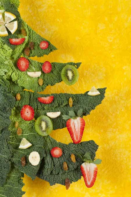 A christmas tree made of kale, strawberries, and other fruit | Foodal.com