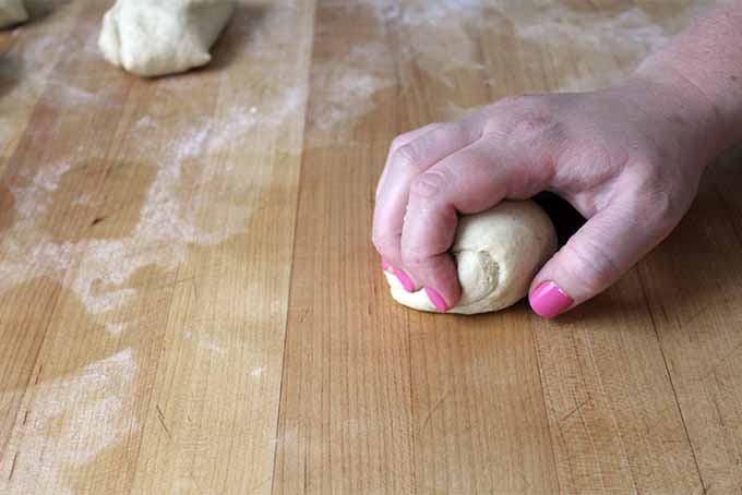 Step 5. Shape pieces of dough into balls.
