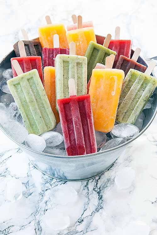 What are paletas? Learn about the history of this Mexican-style frozen treat and get all the tips and tricks you'll need to make your own at home. Read more now on Foodal: https://foodal.com/knowledge/paleo/mexican-paletas/
