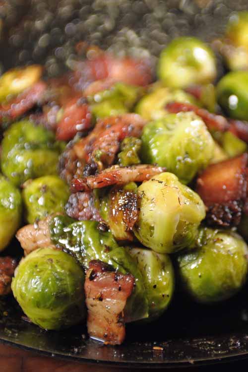 Grab a healthy bite with this Brussels sprouts and bacon dish. The fats from the bacon are actually a good thing as they allow the vitamins from the veggies to pass through your digestive track. Plus it taste great! Get the recipe here: