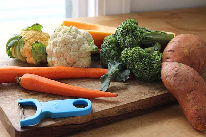Prepping raw vegetables for grilled vegetable salad. | Foodal.com