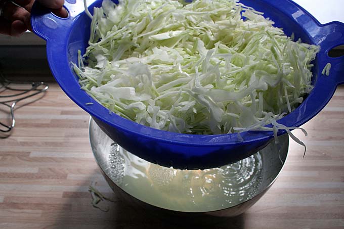 Step 3 of the Bavarian Cabbage Salad Recipe - Drainin the water | Foodal.com