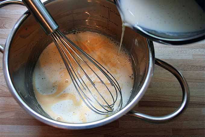 Combine Vanilla-Infused Milk, Egg Yolks, and Sugar to Make This Homemade Vanilla Sauce | Foodal.com