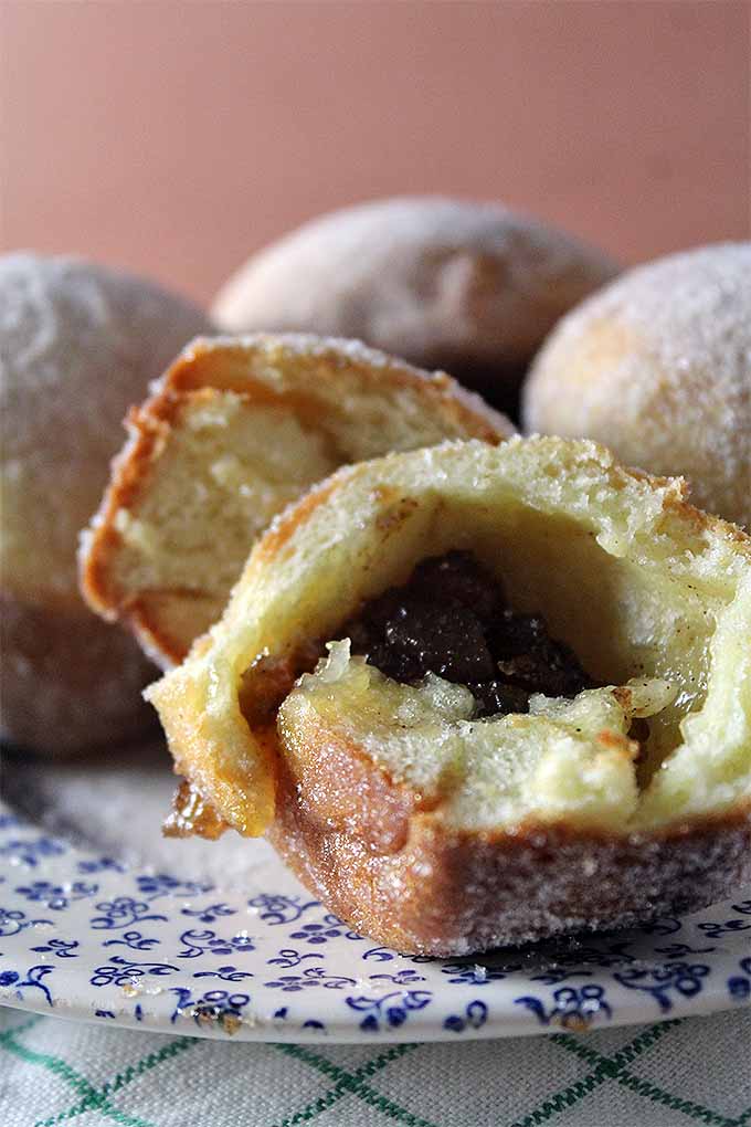 Make the best baked donuts with buttery brioche dough and homemade fruit filling. Get the recipe now: https://foodal.com/recipes/breakfast/baked-doughnuts/