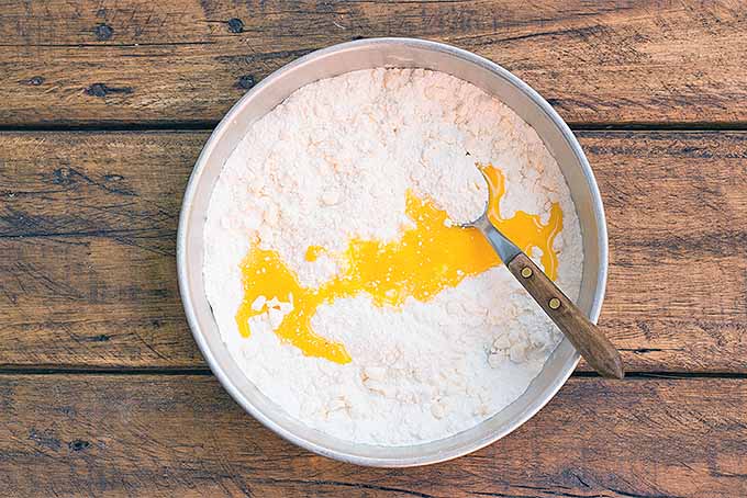 Combine Wet and Dry Ingredients for Galette Crust Dough | Foodal.com