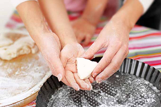Parent and Child Preparing Dough | Foodal.com