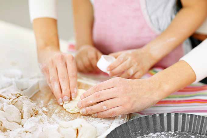 Parent and Child Rolling Dough | Foodal.com