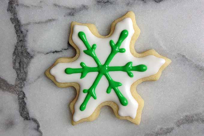 Snowflake Sugar Cookie Decorated with Royal Icing | Foodal.com