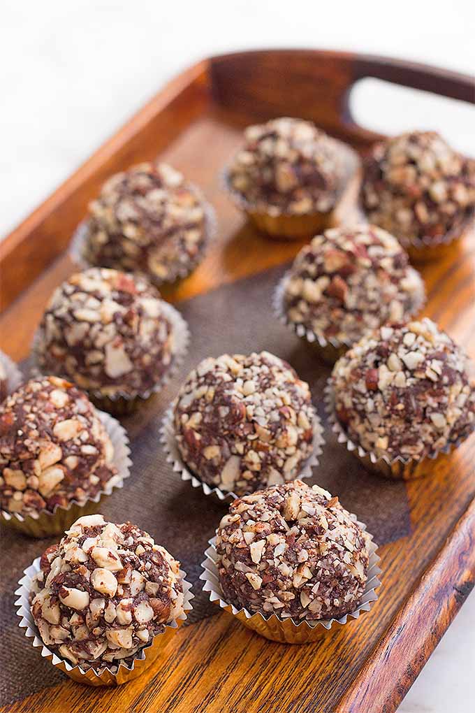 Craving something sweet and decadent. Make these dark chocolate hazelnut truffles at home! We share the recipe: https://foodal.com/recipes/deserts/dark-chocolate-hazelnuts-truffles/