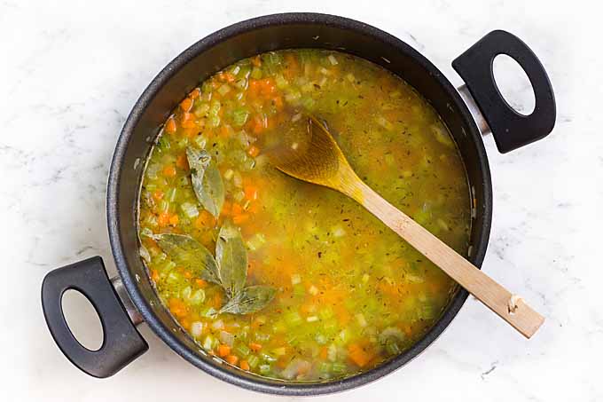 Lemon Orzo Soup Recipe - Step 3 – Add Stock and Bring to a Boil