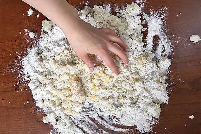Mix the egg yolks, four, and riced baked potato to make gnocchi | Foodal.com