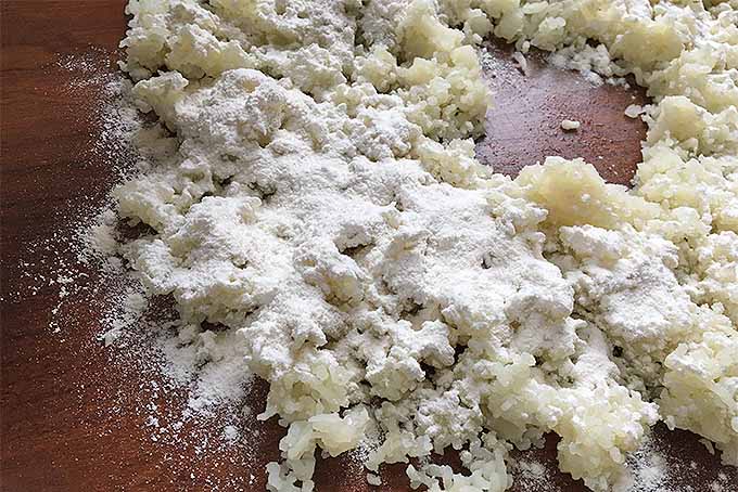 Flour and riced potato being mixed into a dough | Foodal.com