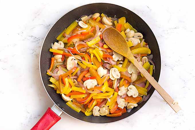 Make sizzling shrimp fajitas for dinner tonight, with fresh bell peppers, mushrooms, and onions.