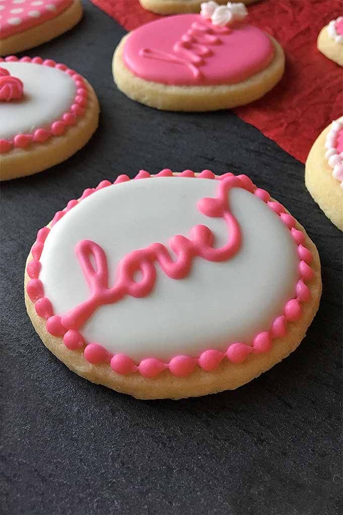 Will you be my valentine? Whoever you give these gorgeous cookies to is sure to say yes! Click the link to check out our decorating tips now or pin it for later: https://foodal.com/recipes/desserts/cookie-decorating-tips-valentines-day/