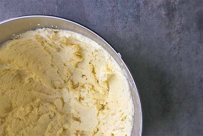 A creamed mixture of eggs, butter, and sugar, which is all part of the process to make the best vanilla cake | Foodal.com