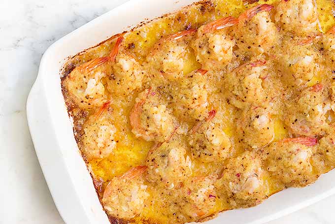 A seafood classic, baked shrimp scampi with a buttery breadcrumb topping. | Foodal.com