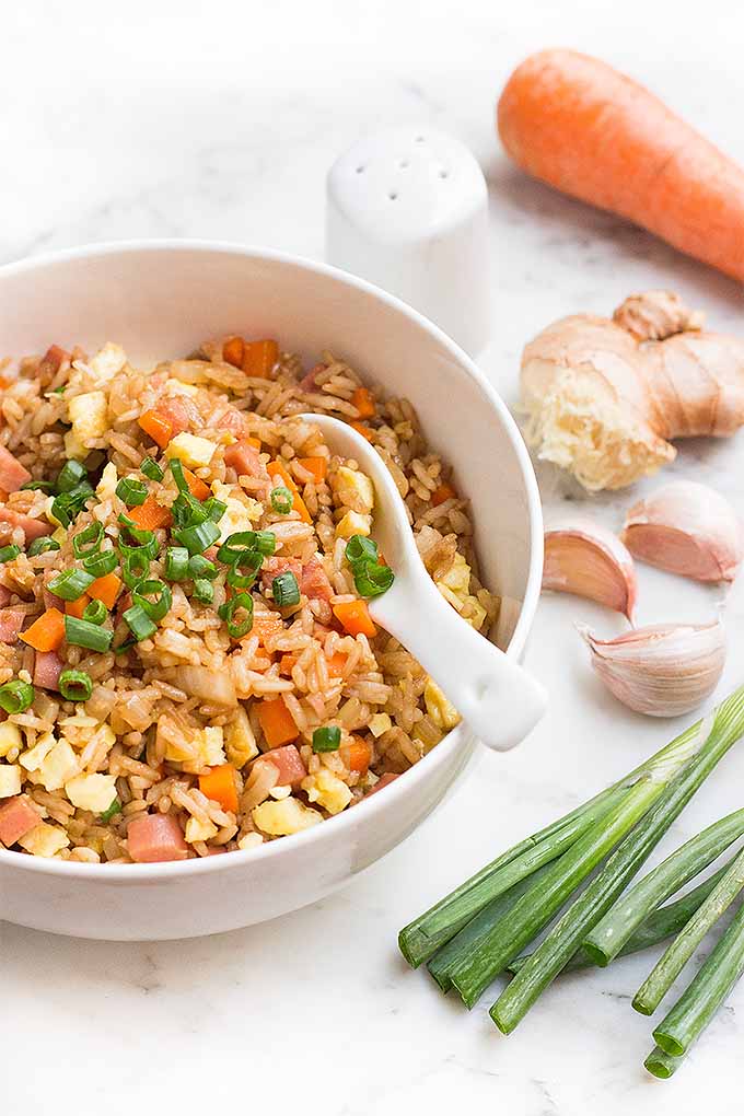 What kind of comfort food takes you right back to your childhood? You'll love this simple recipe for fried rice with fresh veggies, egg, and chicken hot dogs. We share the recipe: https://foodal.com/recipes/chinese/easy-sausage-fried-rice/
