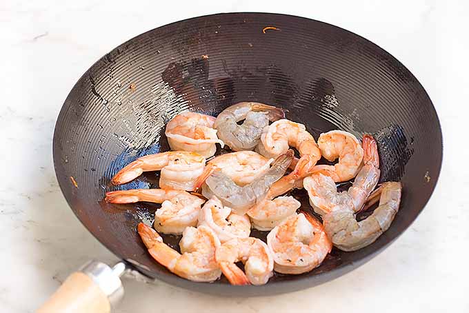 Cooking the shrimp for our chicken and shrimp lo mein | Foodal.com