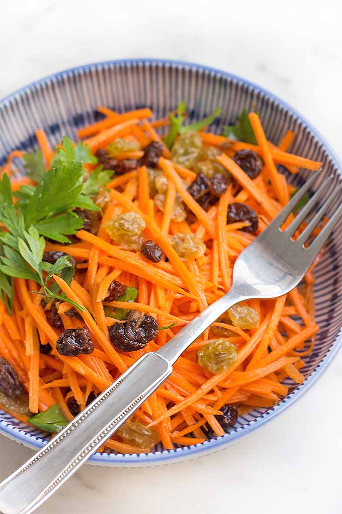 Whip up a fresh and flavorful side dish in just a few minutes with our recipe for Carrot Raisin Salad with Lemon Aioli: https://foodal.com/recipes/salads/carrot-raisin-lemon-aioli/