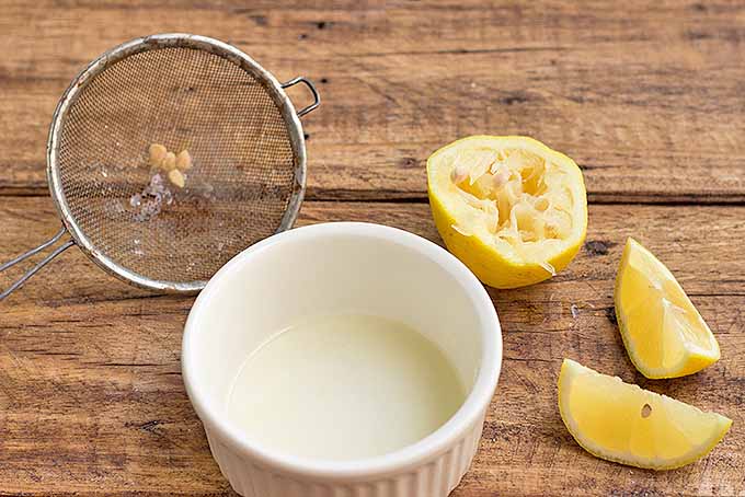 Juice lemons to make our homemade mayo recipe. | Foodal.com