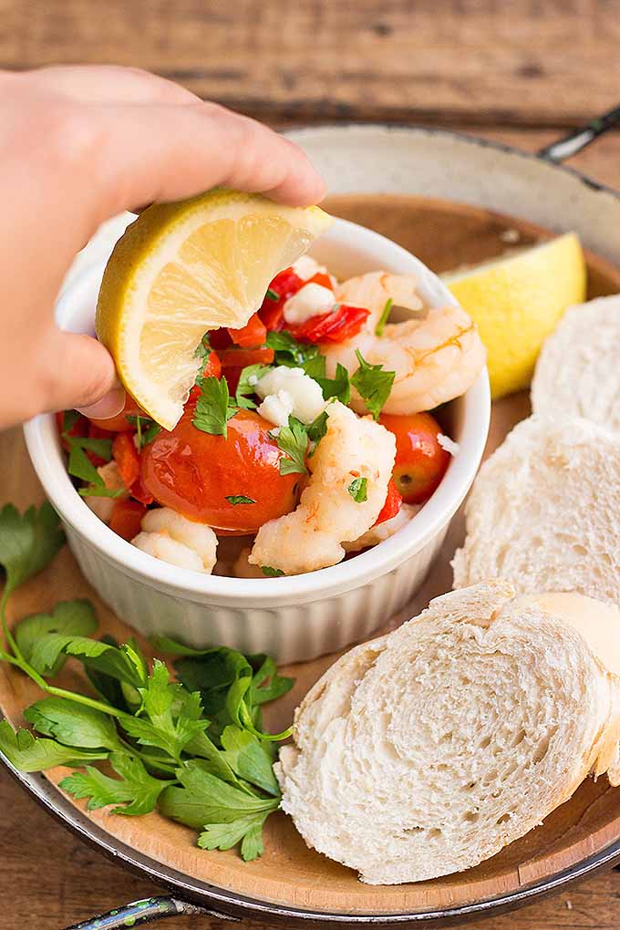 Get dinner on the table in under an hour with this vibrant recipe for roasted tomatoes, shrimp, and feta cheese: https://foodal.com/recipes/fish-and-seafood/tomatoes-with-shrimp-and-feta-cheese/