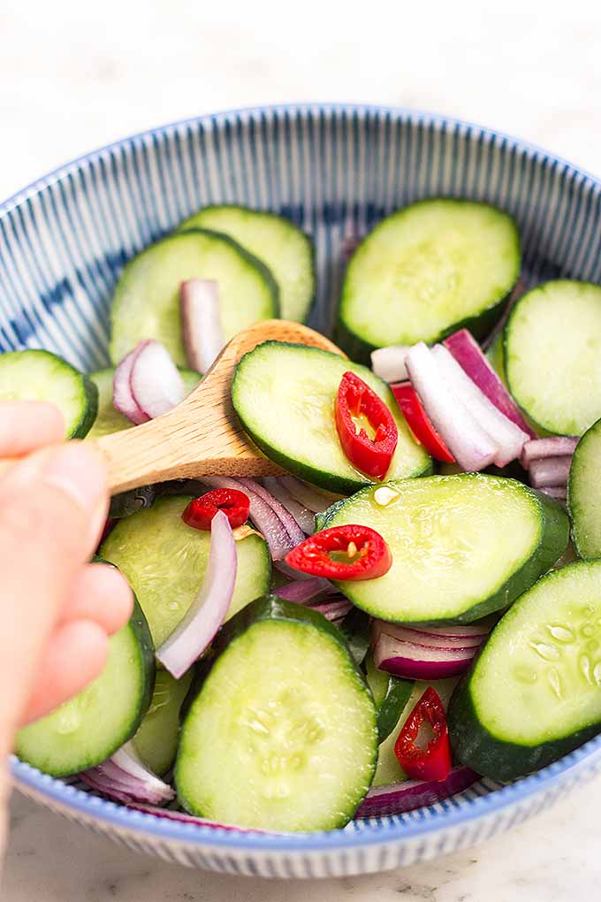 This cucumber salad is the perfect side dish to cool down from our spicy chicken satay dinner. We share both recipes: https://foodal.com/recipes/poultry/chicken-satay/