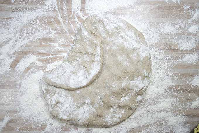 Folding the dough of freshly mixed dark rye bread. | Foodal.com