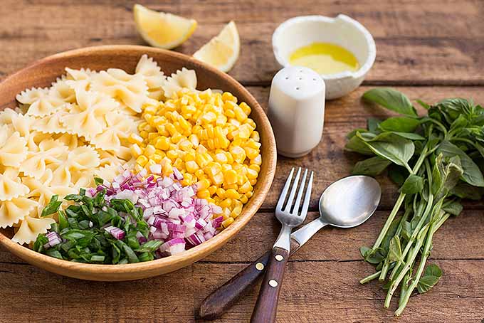 Fresh corn pasta salad combines the sweet flavor of fresh corn with other summery ingredients like basil and lemon. | Foodal.com