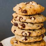 Close up of a stack of vegan chocolate chip cookies.