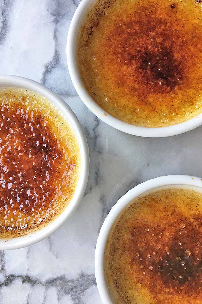 Learn how to make creamy vanilla bean creme brulee with our delicious recipe. Get it now on Foodal: https://foodal.com/recipes/desserts/how-to-make-a-simple-creme-brulee/