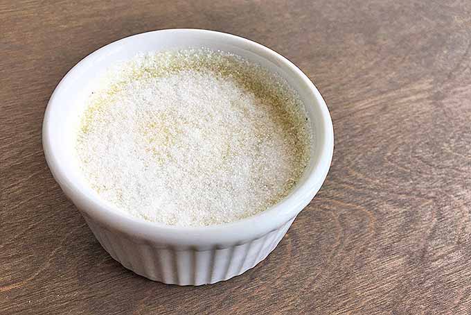Sugar on top of creme brulee, before it is melted. | Foodal.com