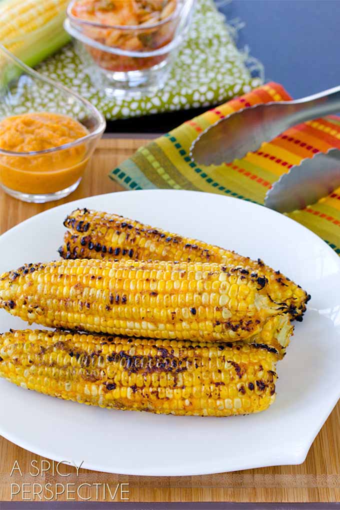 What's the secret ingredient in this delicious grilled corn recipe? Spicy kimchi! We share this recipe and more of our favorites: https://foodal.com/knowledge/paleo/best-sweet-corn-recipes/