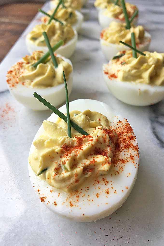 Combined with classic ingredients like relish, mustard, and fresh herbs, our no-may deviled eggs have a great taste, all in one bite! Get our recipe now on Foodal: https://foodal.com/recipes/appetizers/no-mayo-deviled-eggs/