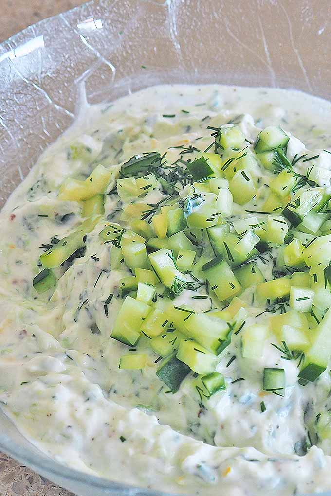 Rich, cool, and creamy, tzatziki is the must-have yogurt and cucumber dip for grilled food, veggies, bread, and much more. We share the recipe: https://foodal.com/recipes/sauces/cool-creamy-tzatziki/
