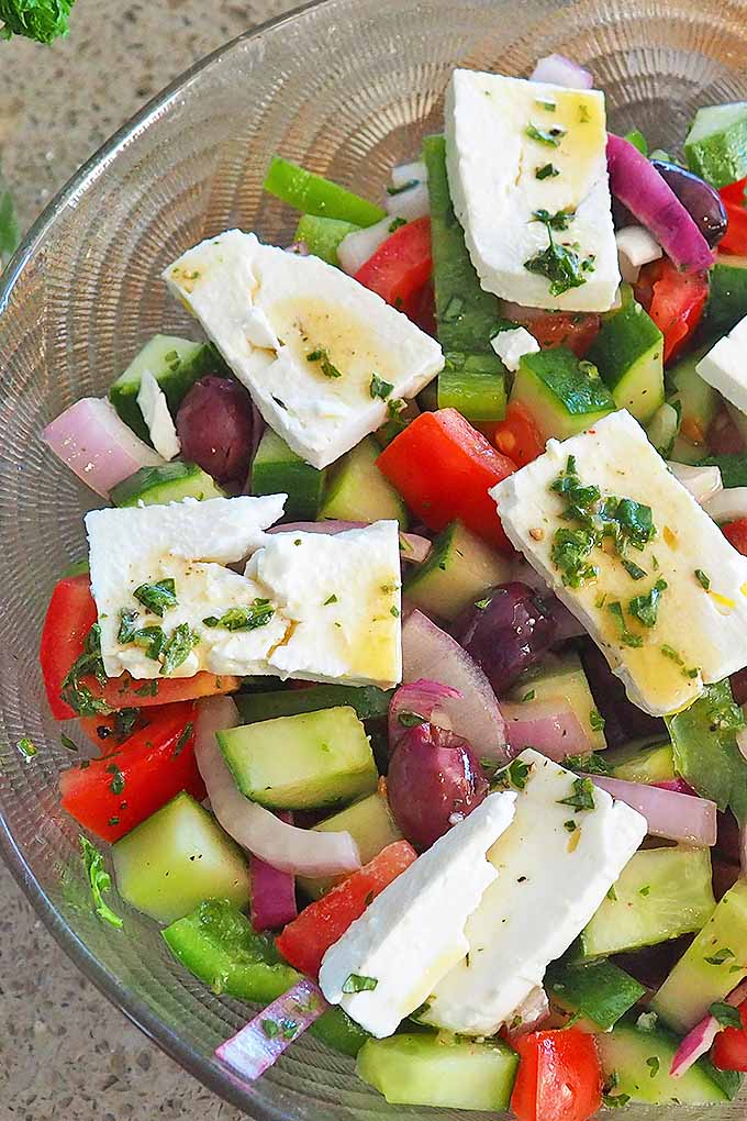 A classic Greek salad showcases a beautiful blending of flavors that make it perfect for a light lunch, or as a side dish for roasted and grilled foods. We share the recipe: https://foodal.com/recipes/salads/classic-greek-salad/