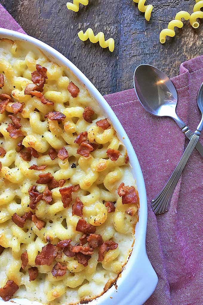 This mac and cheese is full of creamy, cheesy flavor everyone loves. Learn how to make it now: https://foodal.com/recipes/pasta/the-cheesiest-mac-cheese-with-bacon/ 