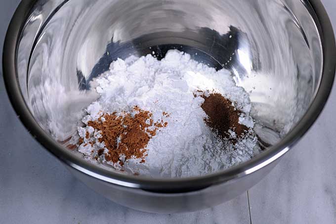 Dry ingedients added to a mixing bowl.