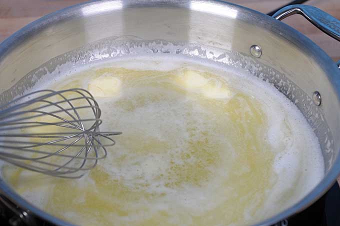 Close up of butter foaming in a saute pan | Foodal