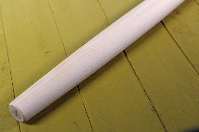 J.K. Adams French style rolling pin on green wooden surface | Foodal