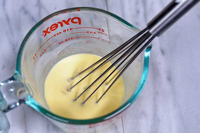 Mix the eggs and buttermilk | Foodal